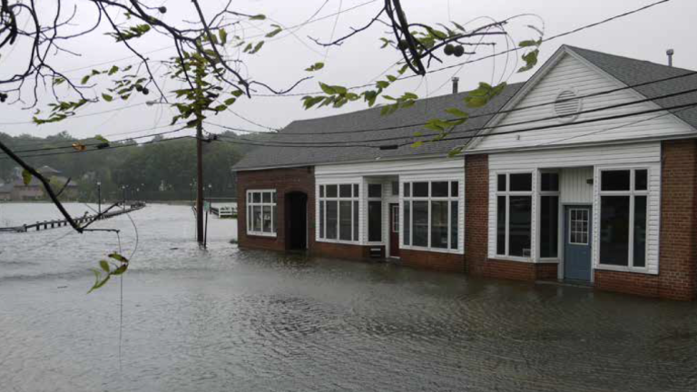 House surrounded by flood water