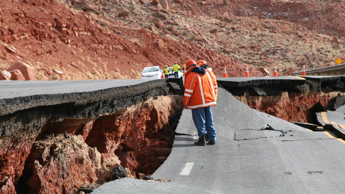 Man working by landslide