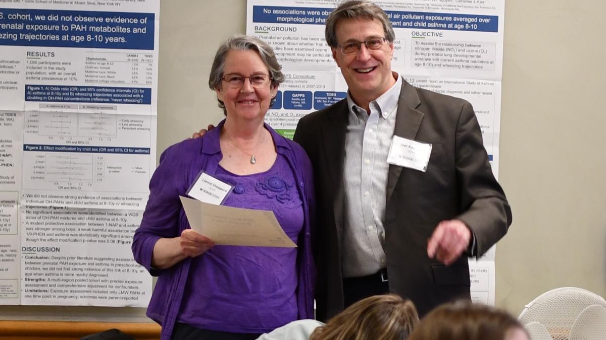Joel Kaufman presents Lianne Sheppard with an award