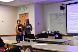 Catherine Karr (right) and Sarah Benki-Nugent present on their work in Kenya.
